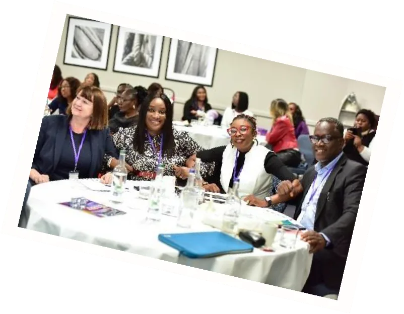 Delegates around a table at the leadership dinner
